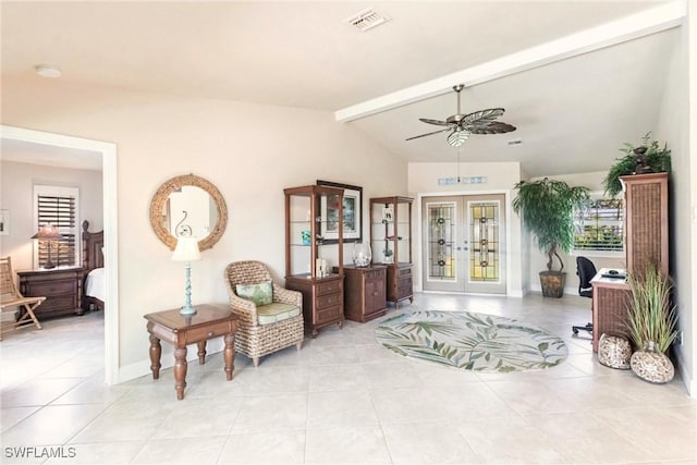 living area featuring french doors, light tile patterned floors, lofted ceiling with beams, and a wealth of natural light