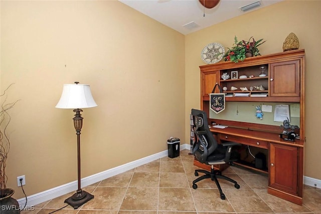 tiled office space with ceiling fan