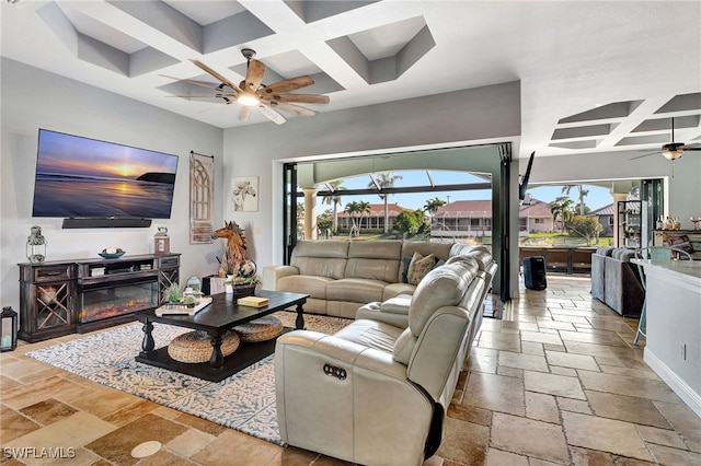 living room featuring coffered ceiling, beam ceiling, and ceiling fan