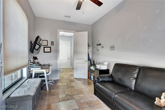 living room featuring ceiling fan