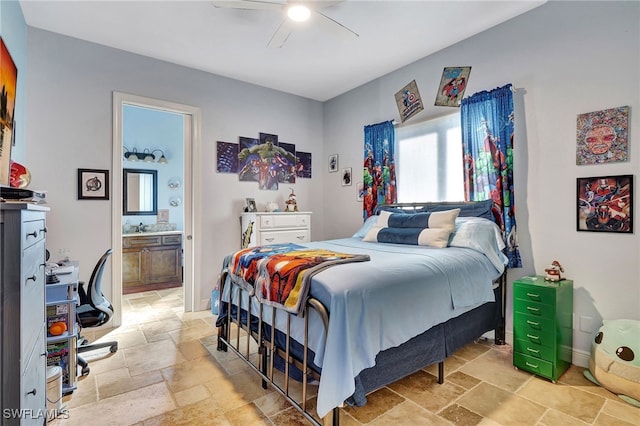 bedroom with ceiling fan and connected bathroom