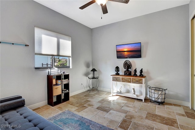 living room featuring ceiling fan