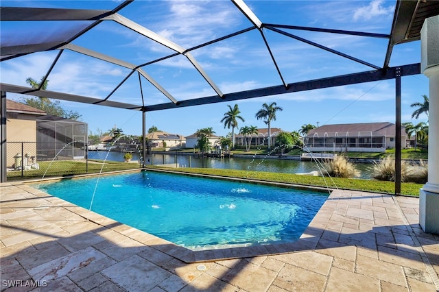 view of swimming pool featuring a patio, a lanai, pool water feature, and a water view