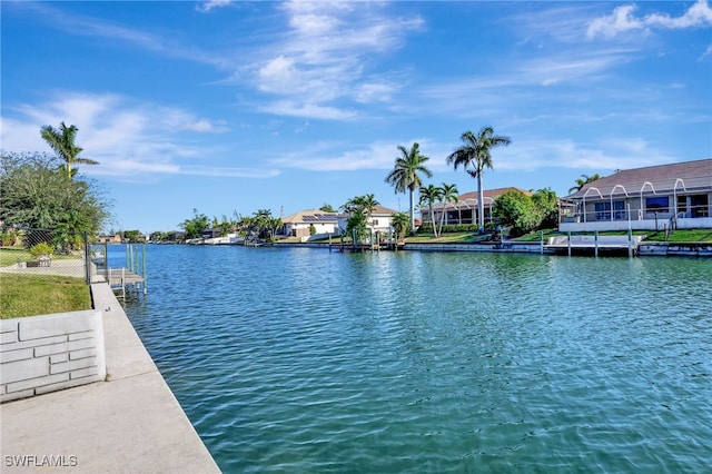 view of water feature with a dock