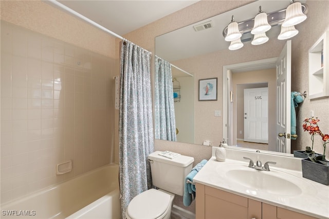 full bathroom with vanity, shower / bath combination with curtain, and toilet