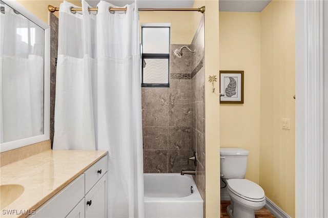 full bathroom with vanity, toilet, and shower / bath combo with shower curtain