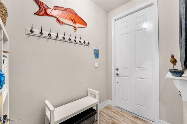 mudroom with light hardwood / wood-style flooring