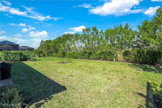 view of yard featuring fence