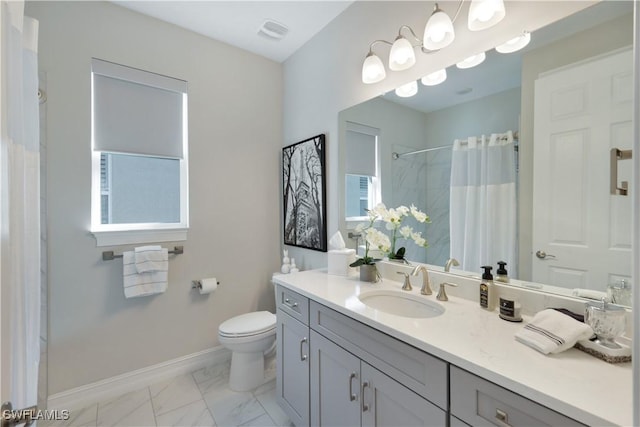 full bathroom featuring toilet, a shower with shower curtain, vanity, visible vents, and marble finish floor