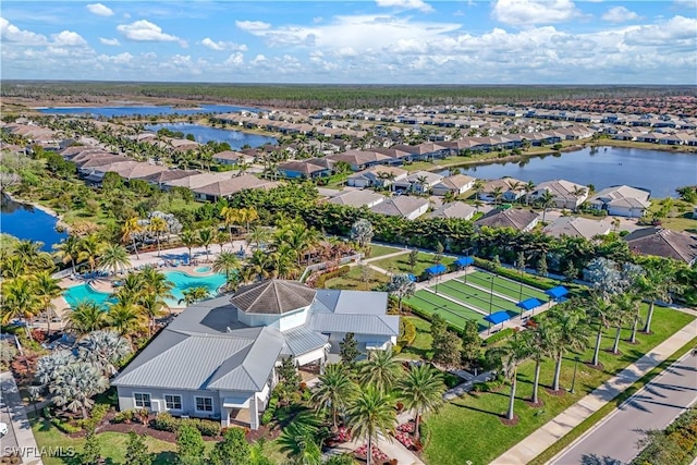 aerial view featuring a residential view and a water view