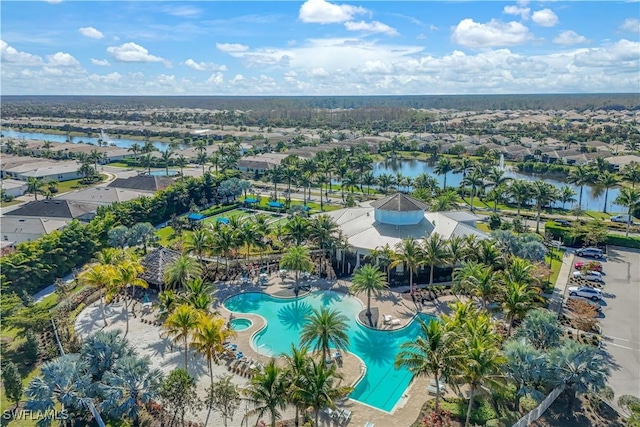 bird's eye view with a water view