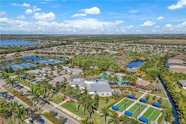 bird's eye view featuring a water view and a residential view