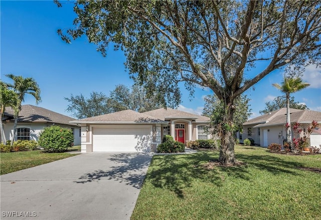 ranch-style home with a garage and a front lawn