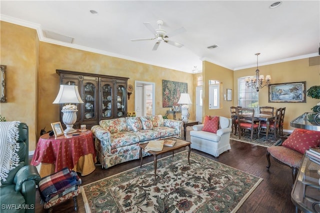 living room featuring dark hardwood / wood-style flooring, crown molding, and ceiling fan with notable chandelier