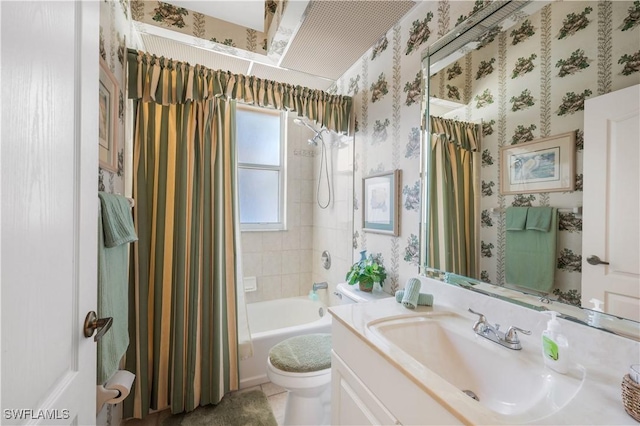 full bathroom with vanity, shower / bath combination with curtain, and toilet