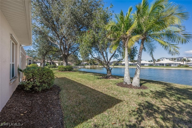 view of yard with a water view