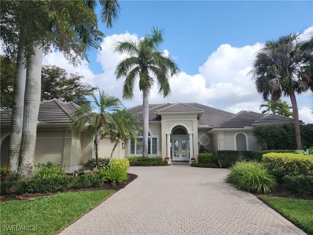 23069 Shady Knoll Dr, Estero, FL 34135 - view of mediterranean / spanish-style home