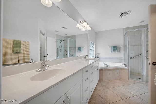 bathroom with vanity, plus walk in shower, and tile patterned flooring