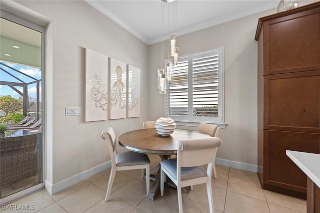 tiled dining room with ornamental molding