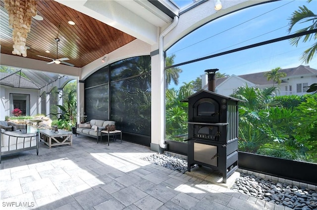 view of patio featuring outdoor lounge area and ceiling fan