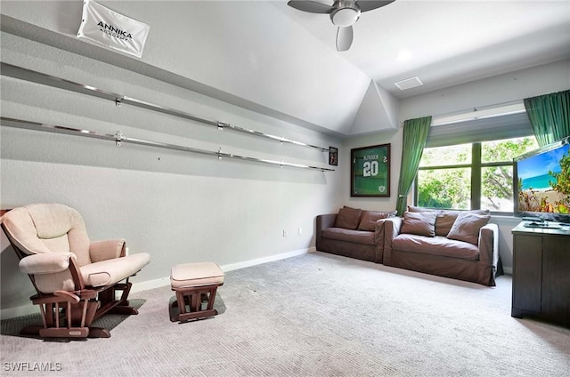 carpeted living room with ceiling fan