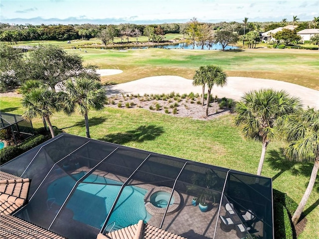 view of swimming pool with a water view and an in ground hot tub