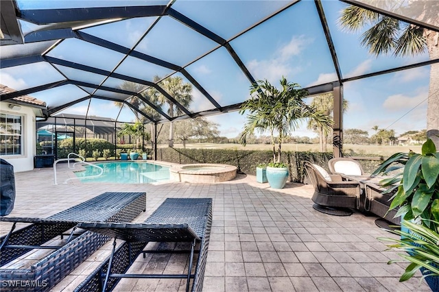 view of patio featuring a swimming pool with hot tub and glass enclosure