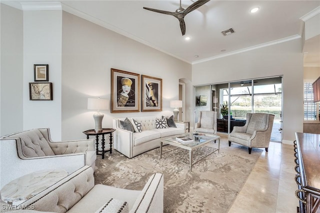 living room with crown molding and ceiling fan