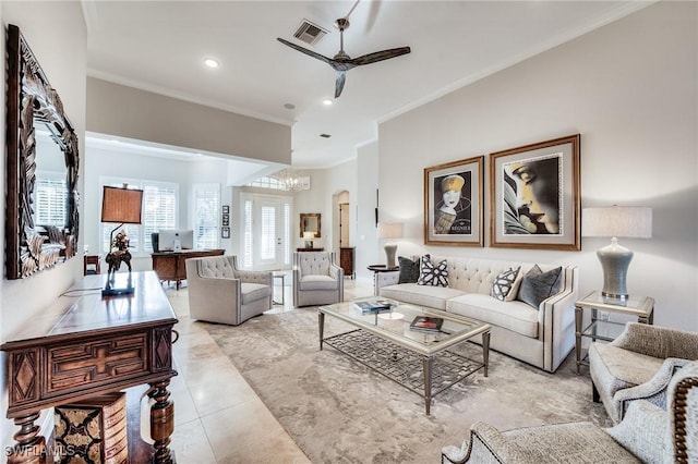 living room featuring ornamental molding, light tile patterned floors, and ceiling fan