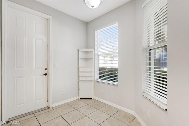 interior space featuring light tile patterned floors