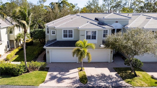 view of front of property featuring a garage