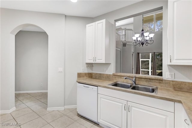 kitchen featuring white cabinetry, dishwasher, sink, and light tile patterned floors