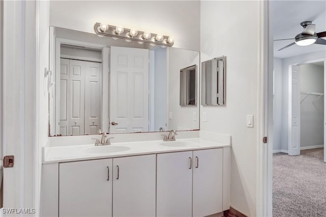 bathroom with vanity and ceiling fan