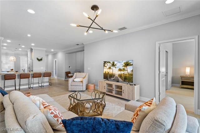 living room featuring crown molding, recessed lighting, baseboards, and a chandelier