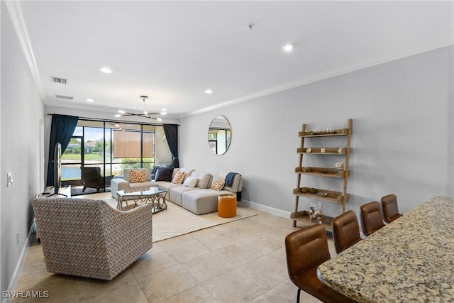 living room with ornamental molding, baseboards, a chandelier, light tile patterned flooring, and recessed lighting