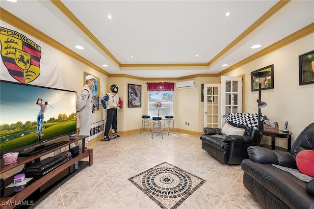 living room featuring a raised ceiling, ornamental molding, a wall mounted air conditioner, and french doors