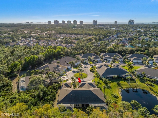 drone / aerial view with a water view