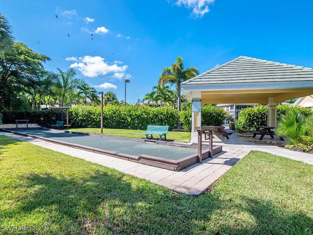 view of home's community with a gazebo and a lawn