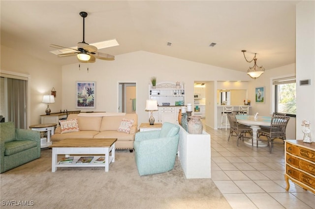 tiled living room with vaulted ceiling and ceiling fan