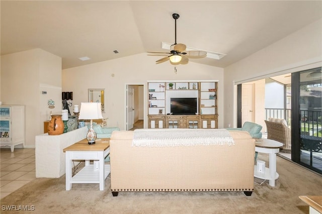 living room with vaulted ceiling, light tile patterned floors, and ceiling fan