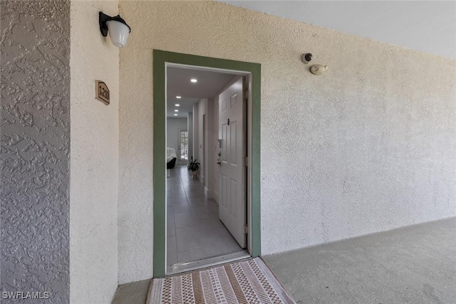 23710 Walden Center Dr Unit 210, Estero, FL 34134 - view of exterior entry featuring stucco siding