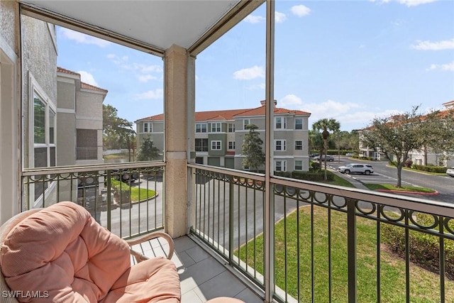 balcony featuring a residential view