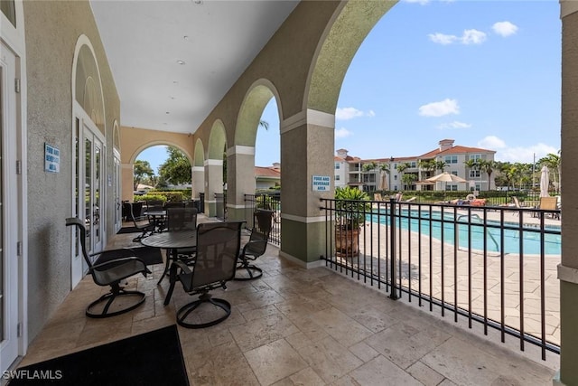 view of patio / terrace with a community pool