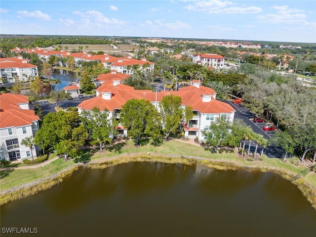 drone / aerial view with a water view