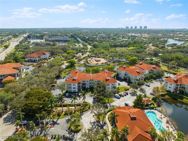 aerial view featuring a view of city and a water view