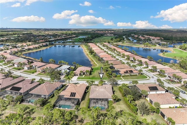 bird's eye view with a water view