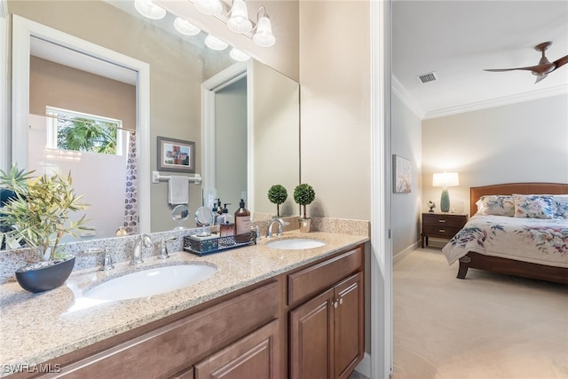 bathroom with vanity, crown molding, and ceiling fan