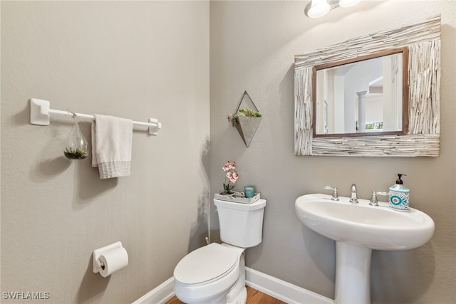 bathroom featuring toilet