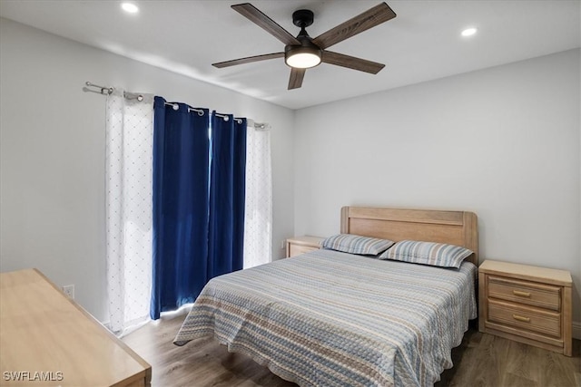 bedroom with ceiling fan, recessed lighting, and light wood-style floors