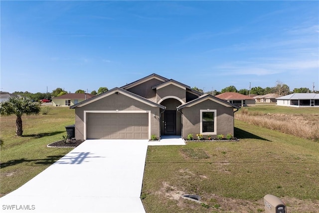 single story home featuring a garage and a front lawn